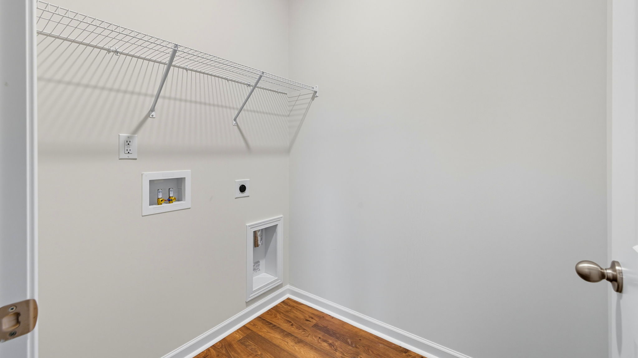 Walk-in laundry room.