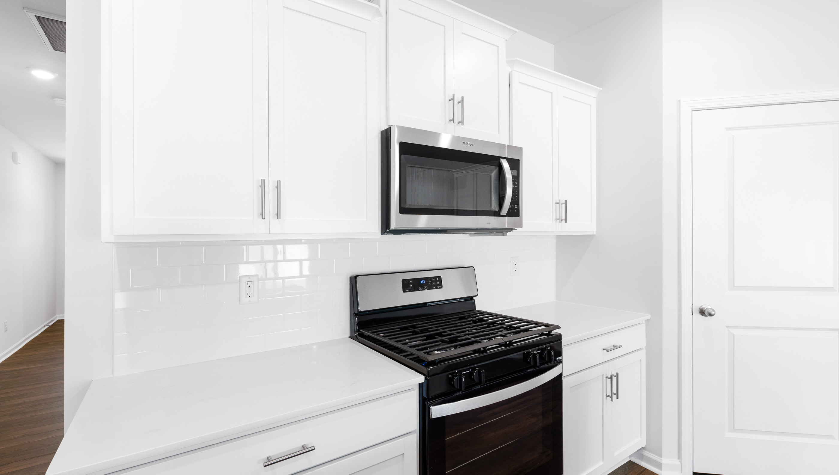 Kitchen with island and granite counter tops.