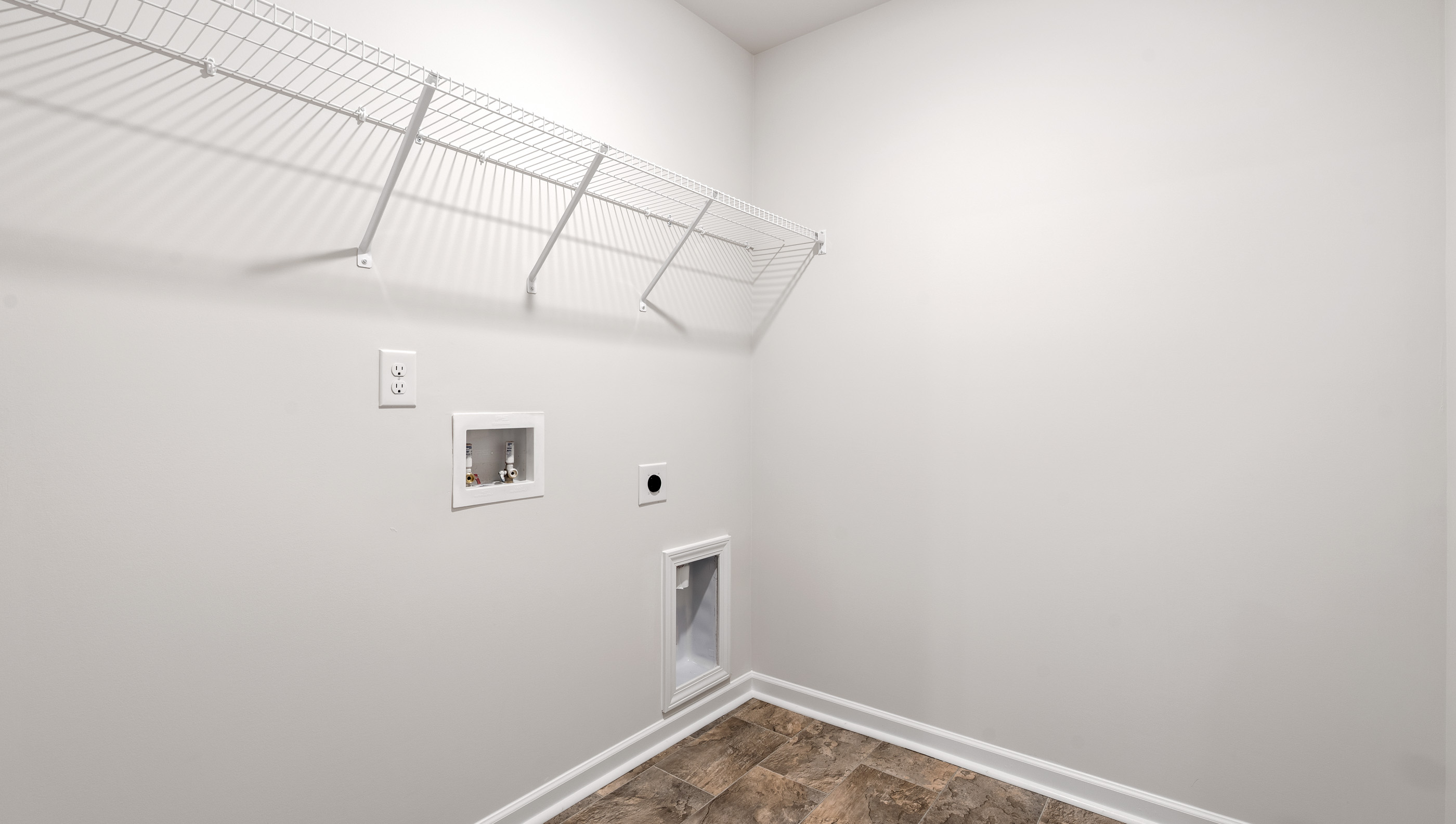 Walk-in laundry room.