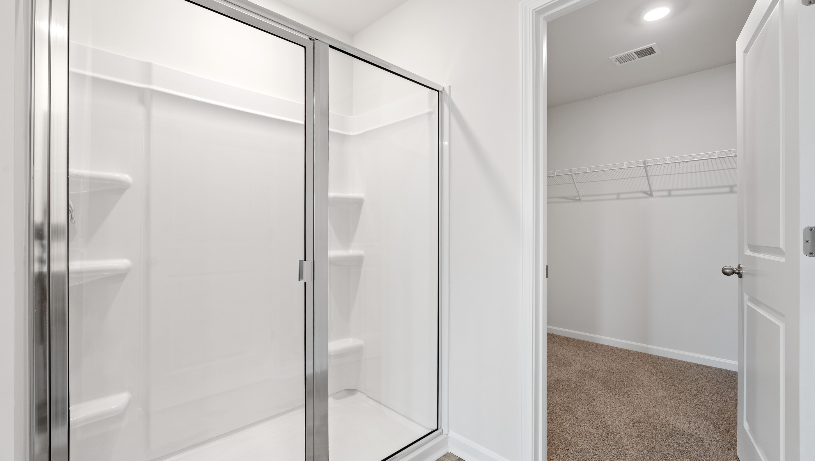 Primary bathroom walk-in shower.