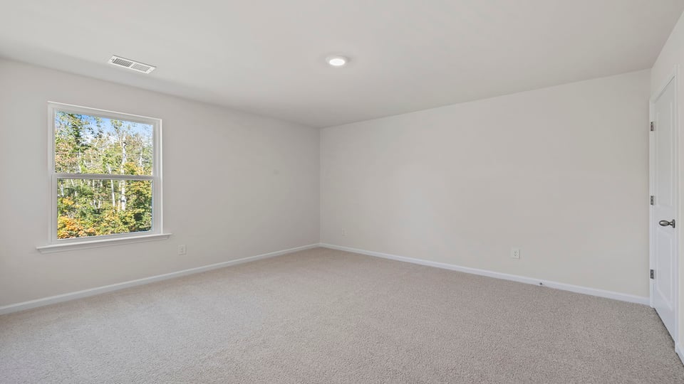 Kitchen with stainless steel appliances and walk in pantry.