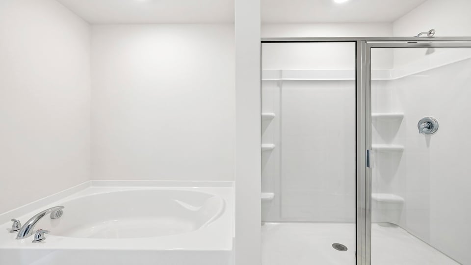 Primary bathroom with walk-in shower and garden tub is optional