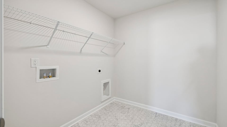 Walk-in laundry room.