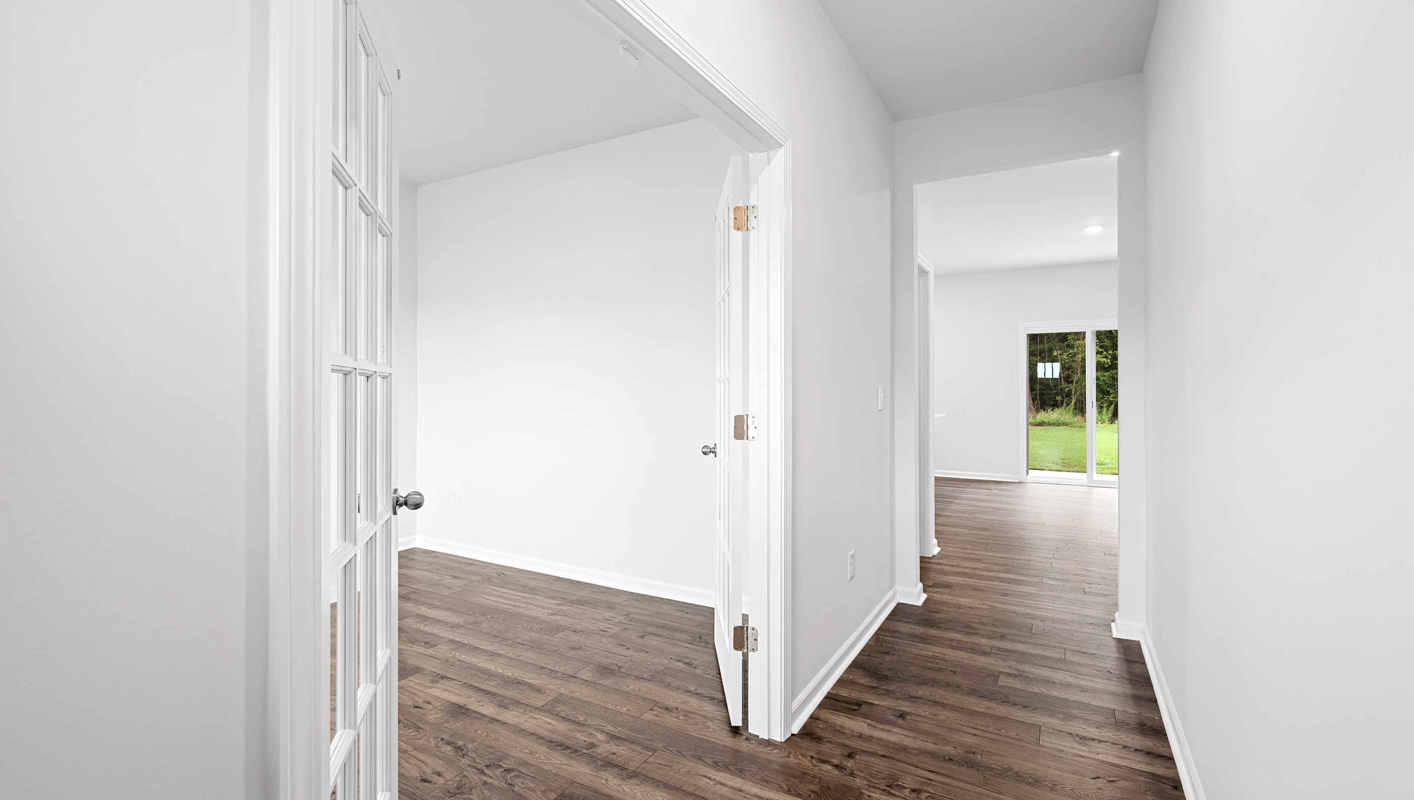 View of entrance to study and hallway to the living areas.
