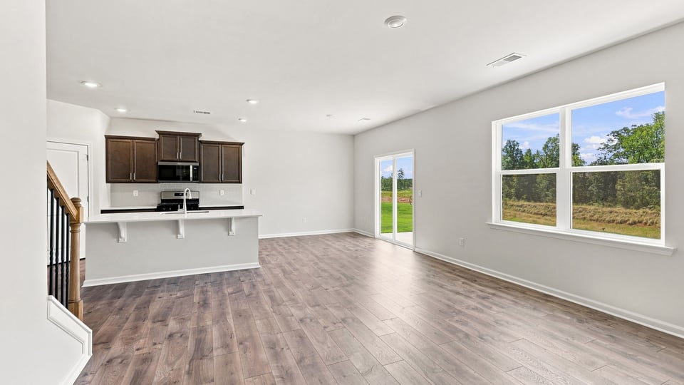 Living room with window and fireplace.