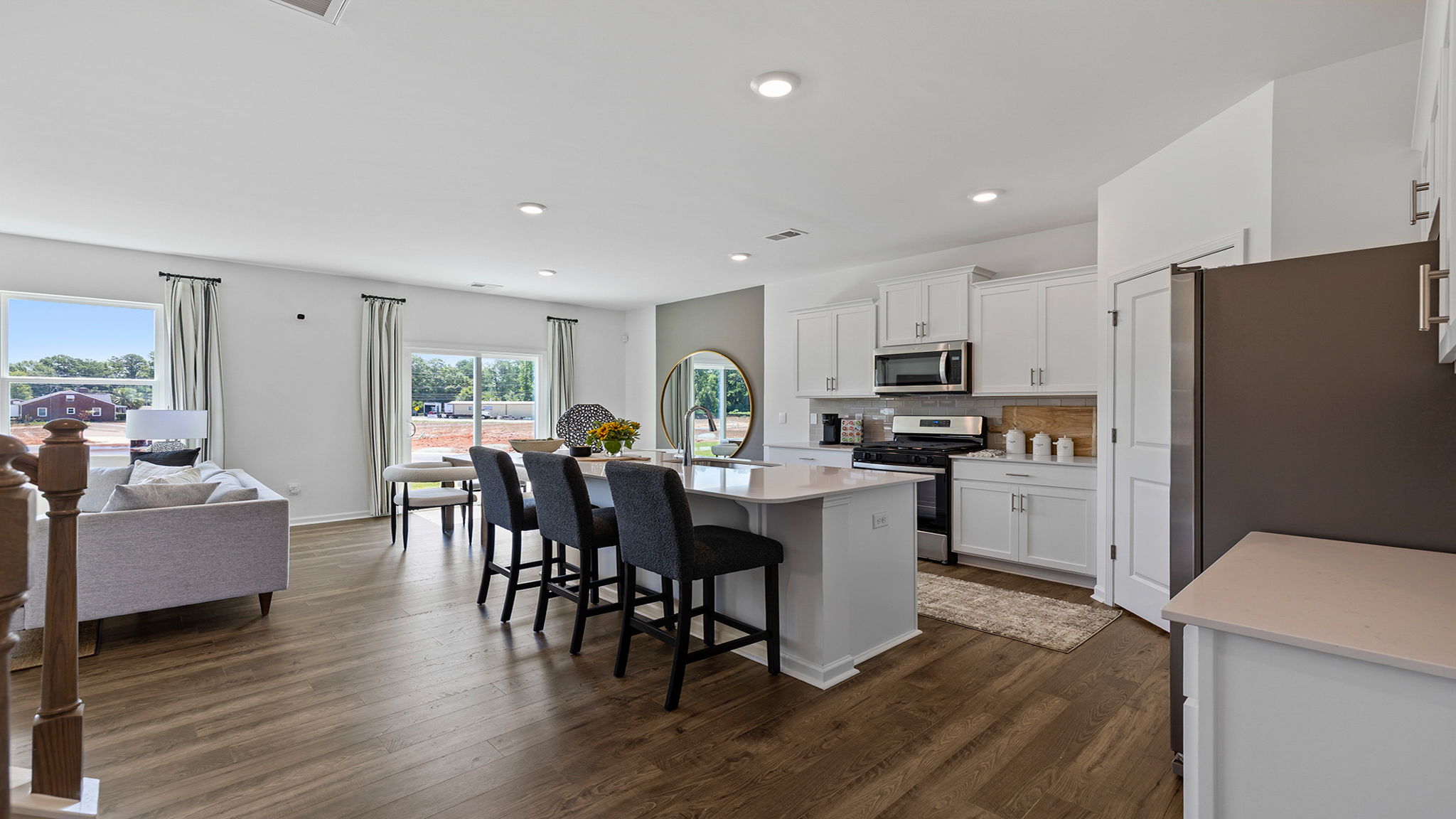 Kitchen with island and cabinets.