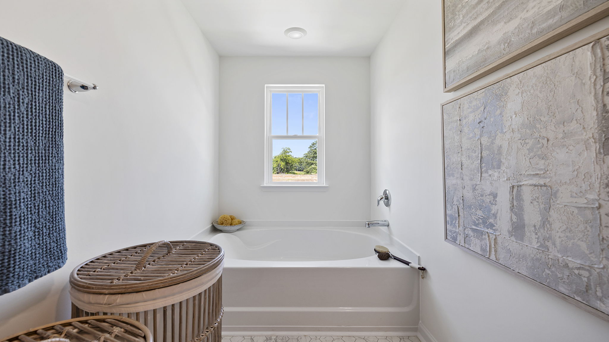 Primary bathroom with double vanity sinks.