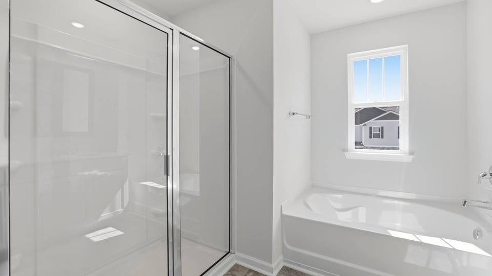Primary bathroom with double vanity sink.
