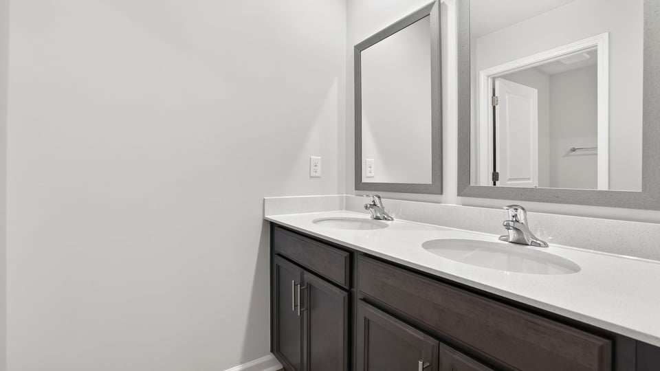 Bathroom with double vanity sink.