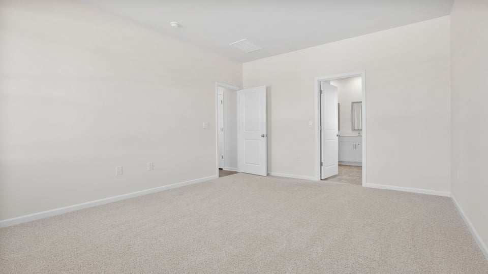 Primary bedroom on the upper level.