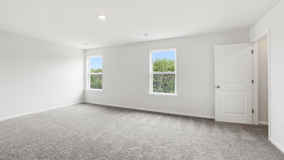 Bedroom with windows.