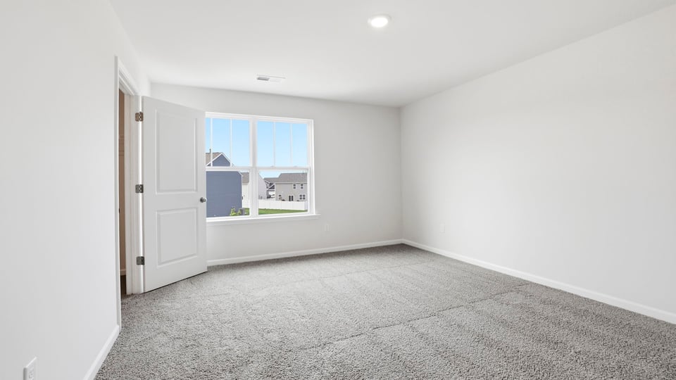 Bedroom with windows.