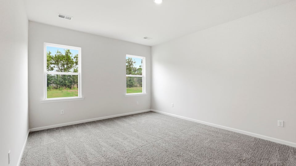 Bedroom with windows.