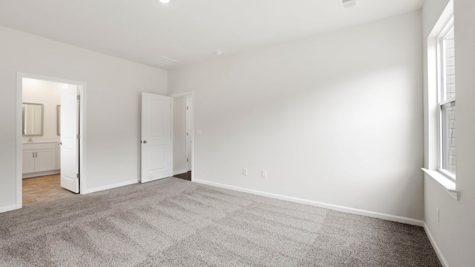 Bedroom with windows.