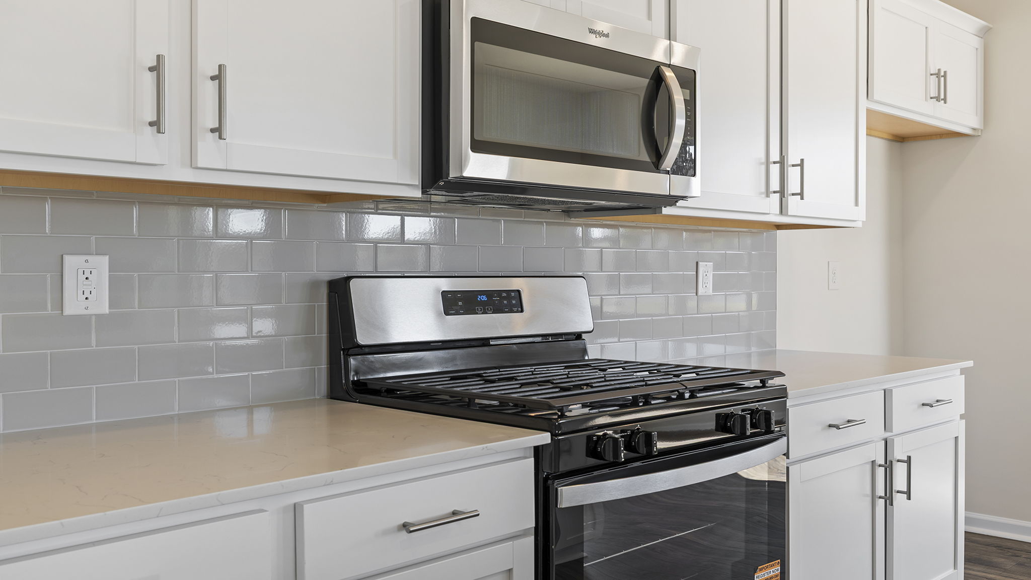 Kitchen with island and cabinets.