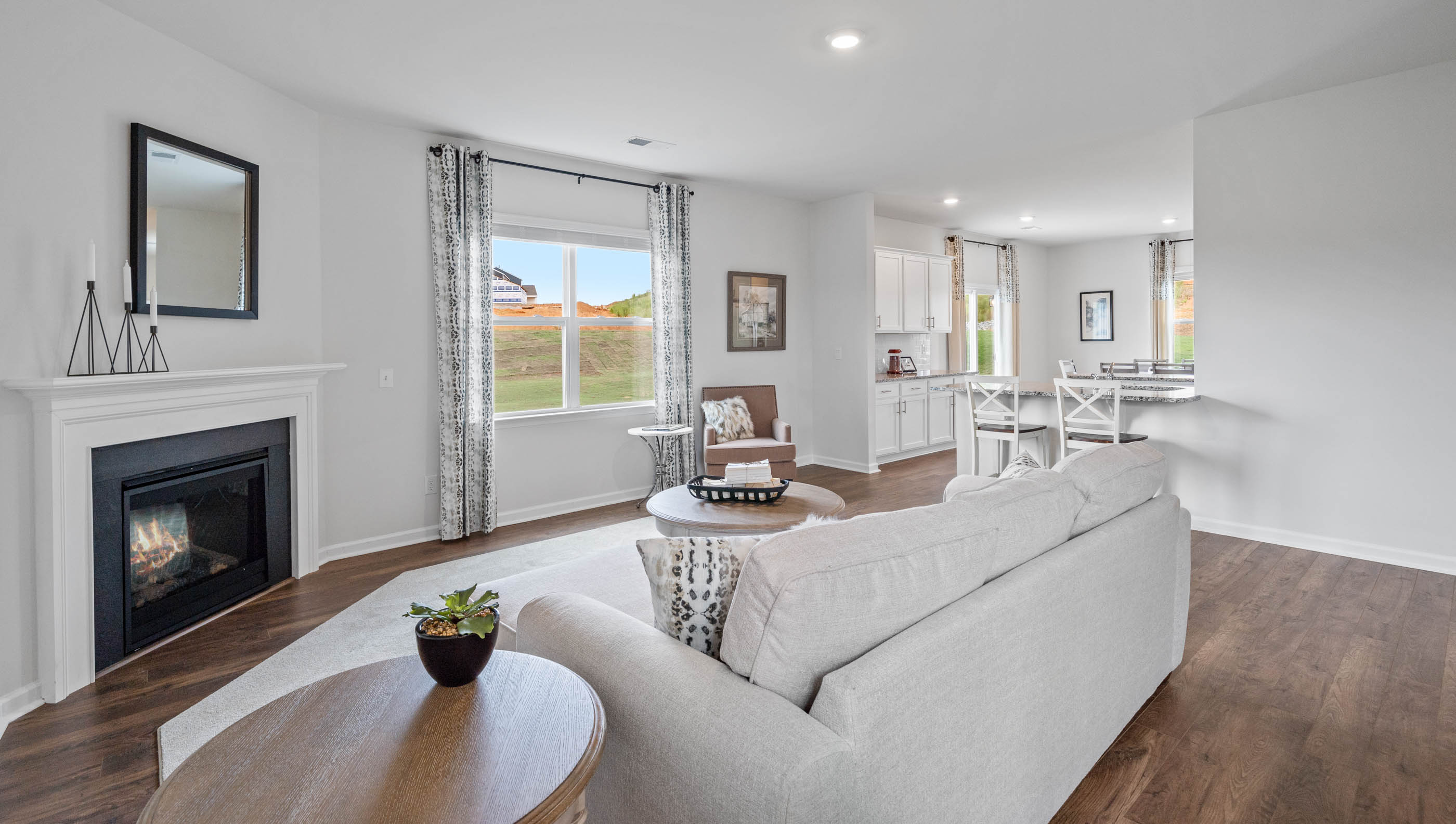 Family room with window and fireplace.