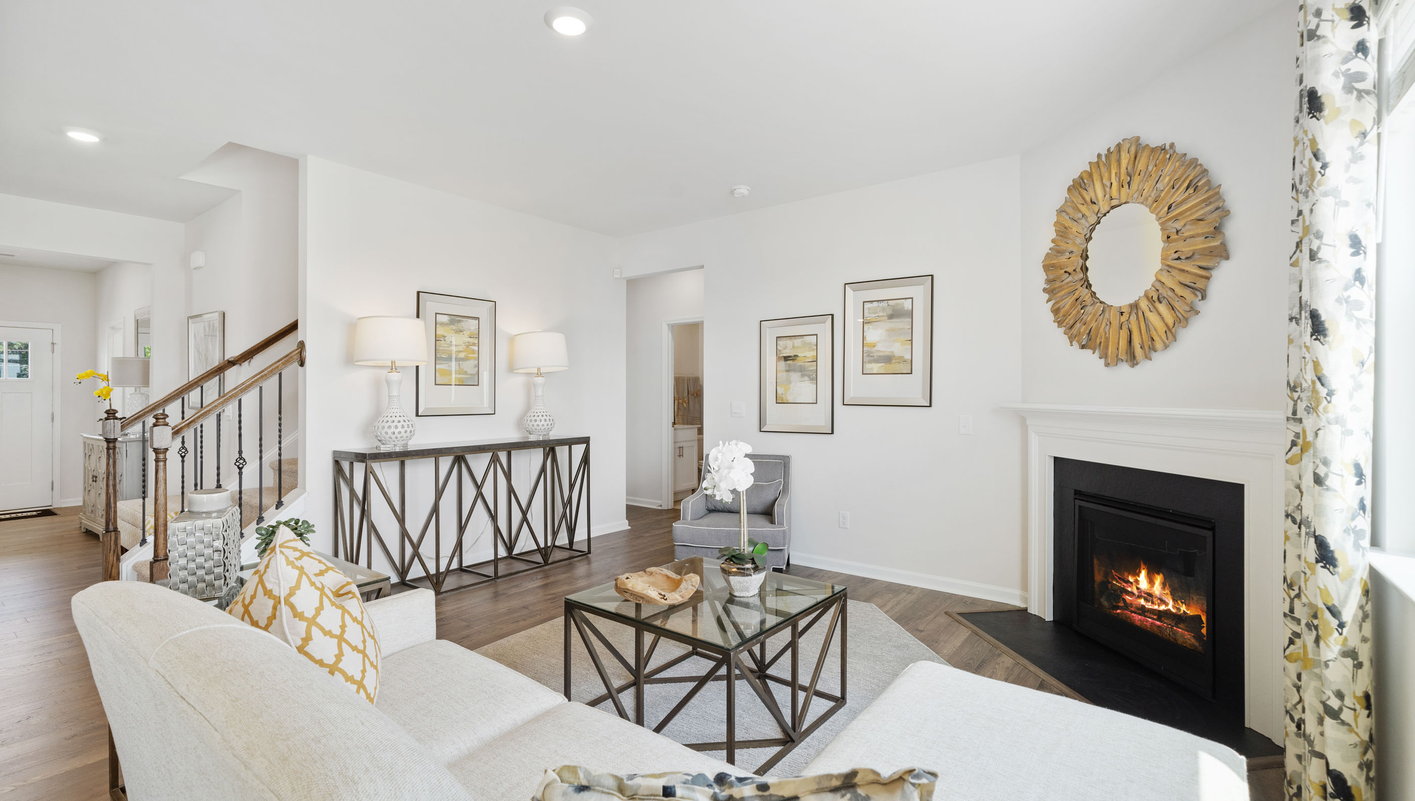Family room with windows and fireplace.