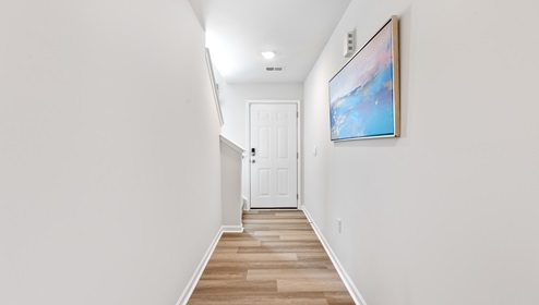 Foyer with front entrance view.