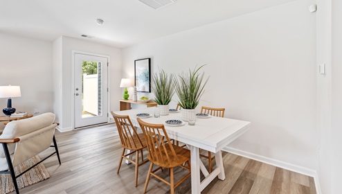 Dining room with door to patio.