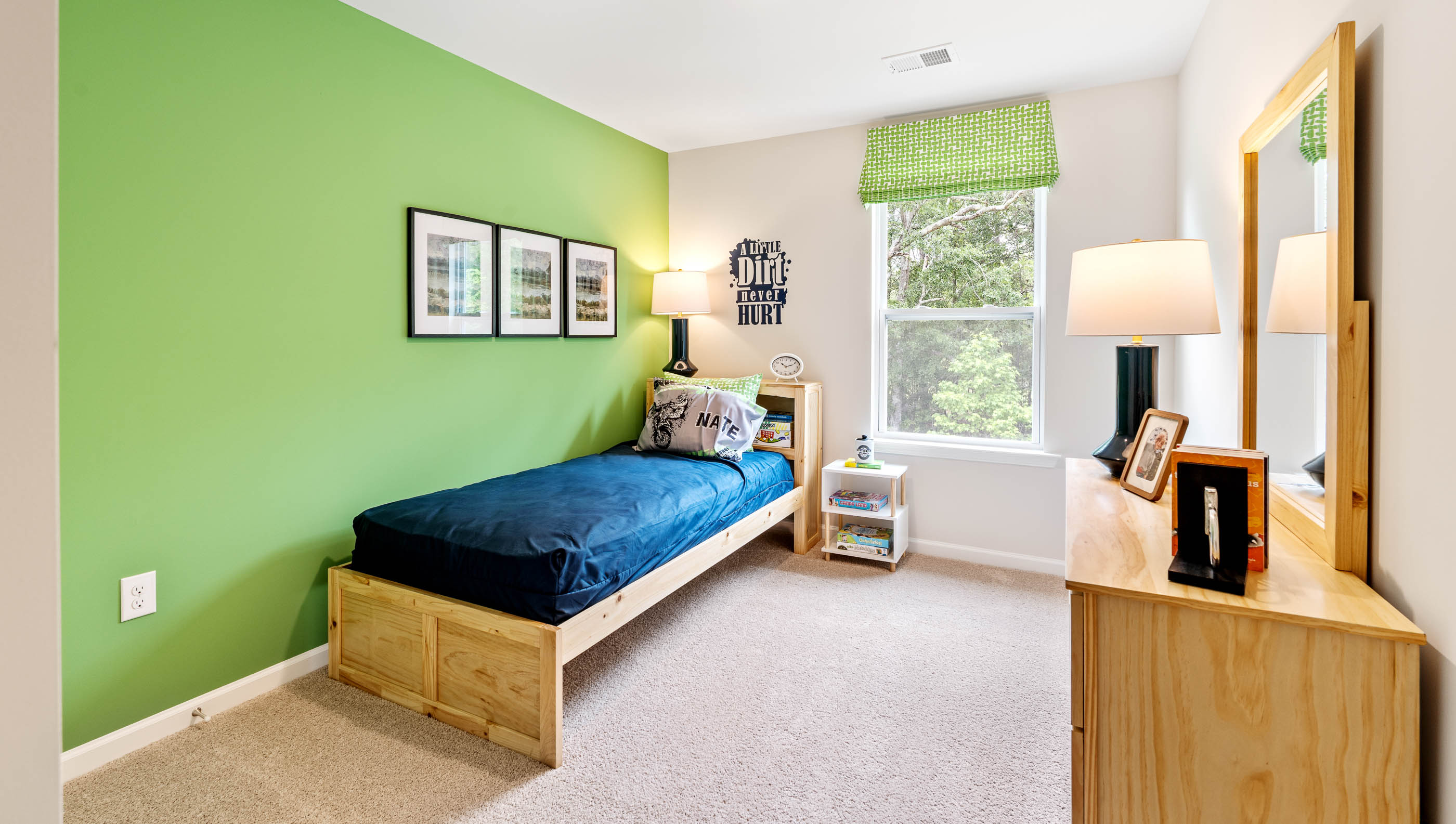 Bedroom with carpet and windows.