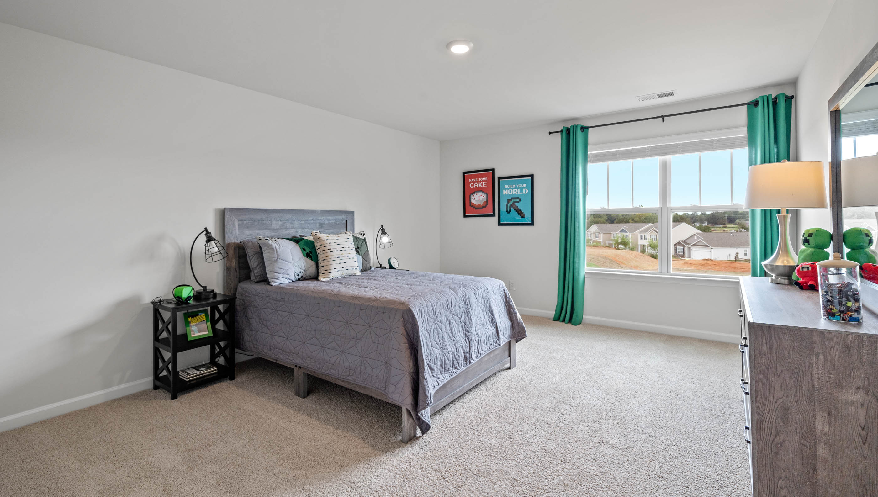 Bedroom with carpet and window.