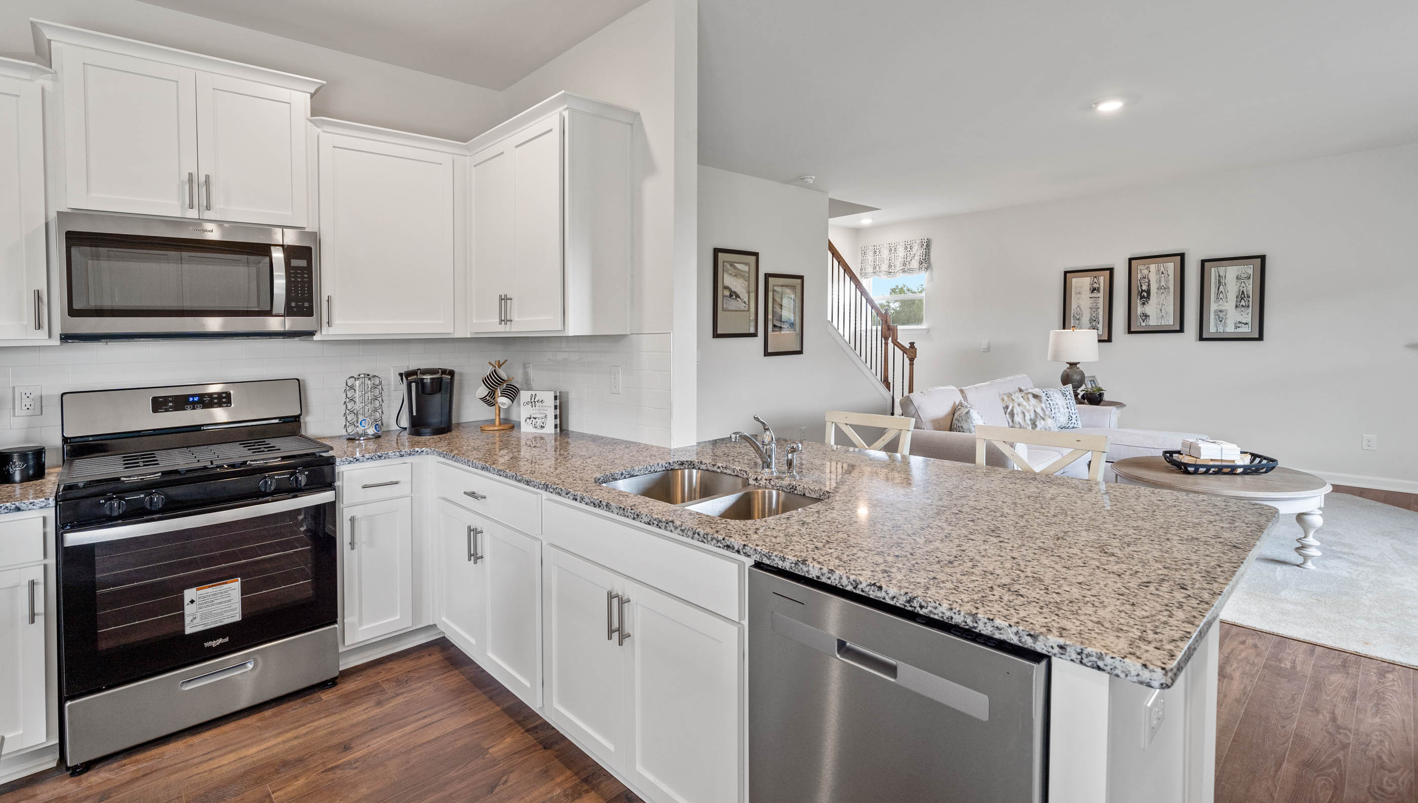 Kitchen with island and cabinets.