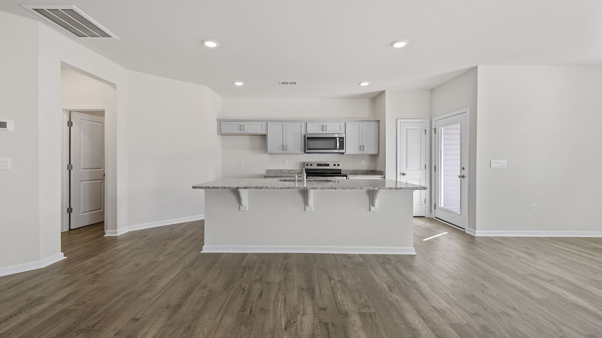 Kitchen island with granite countertops.