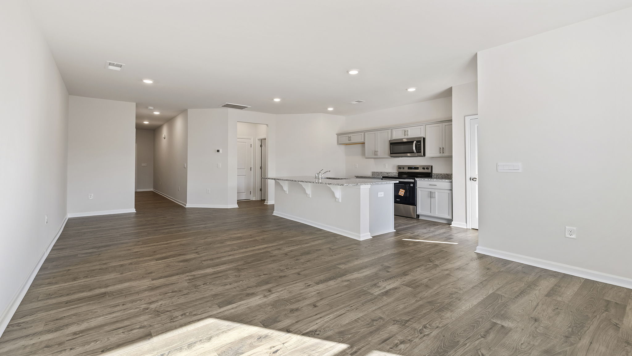 Open floorplan with lots of windows.