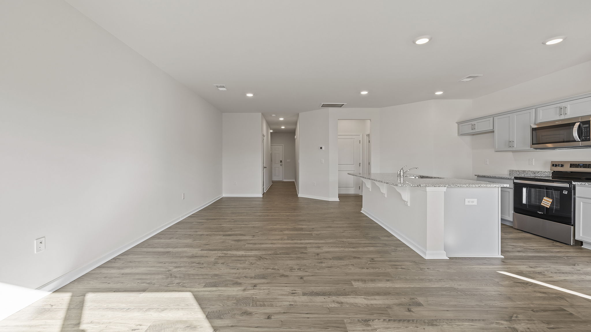 Open floorplan with lots of windows.