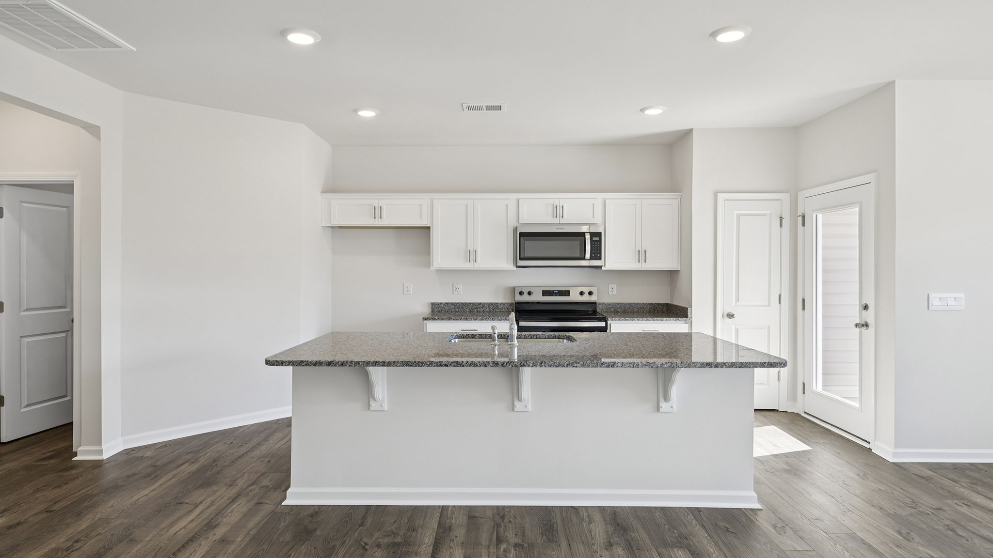 Kitchen island with granite countertops.