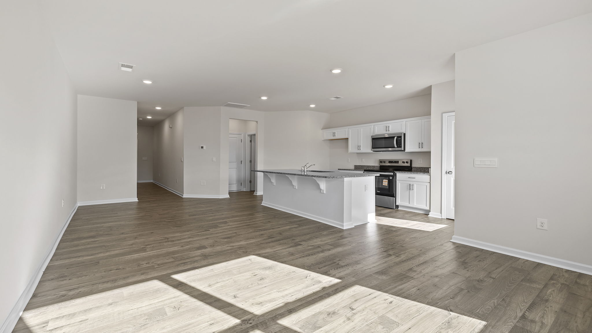 Open floorplan with lots of windows.