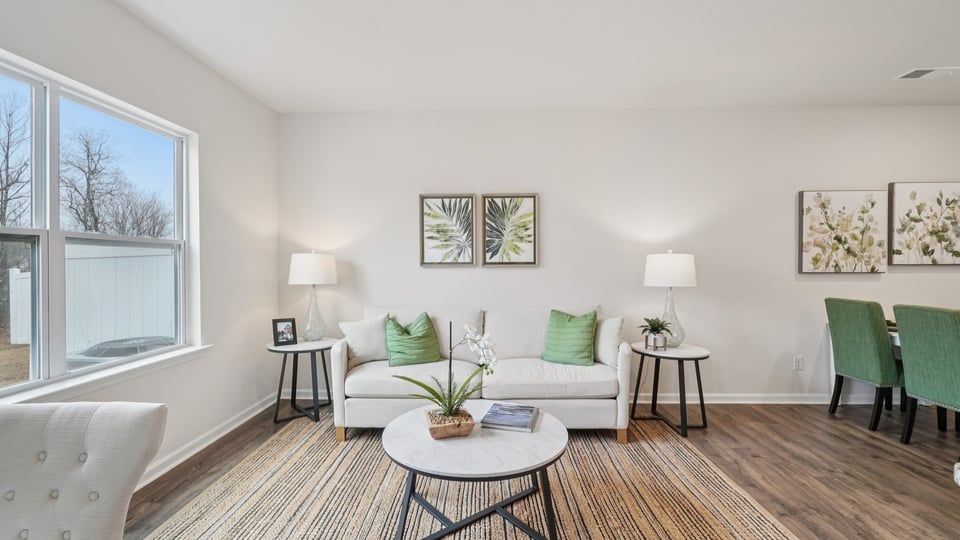Family room with windows and fireplace.