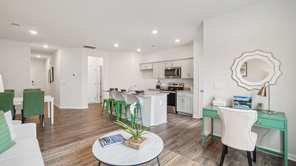 Family room with windows and fireplace.