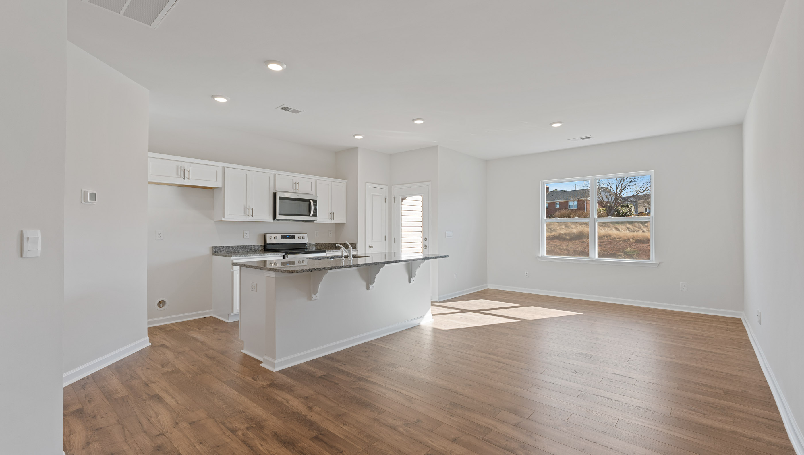Open floorplan with lots of windows.