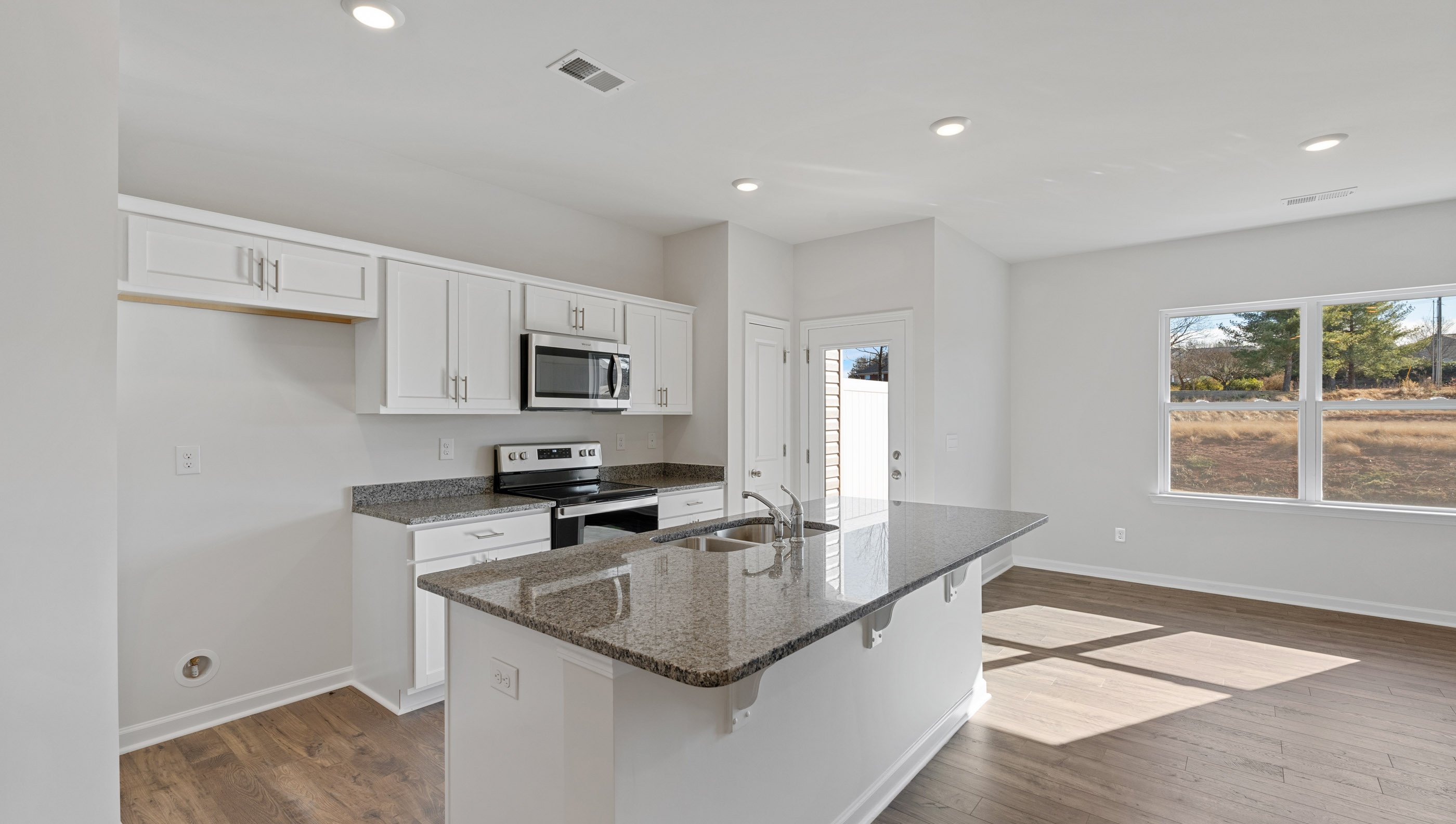Kitchen island with granite coutertops.