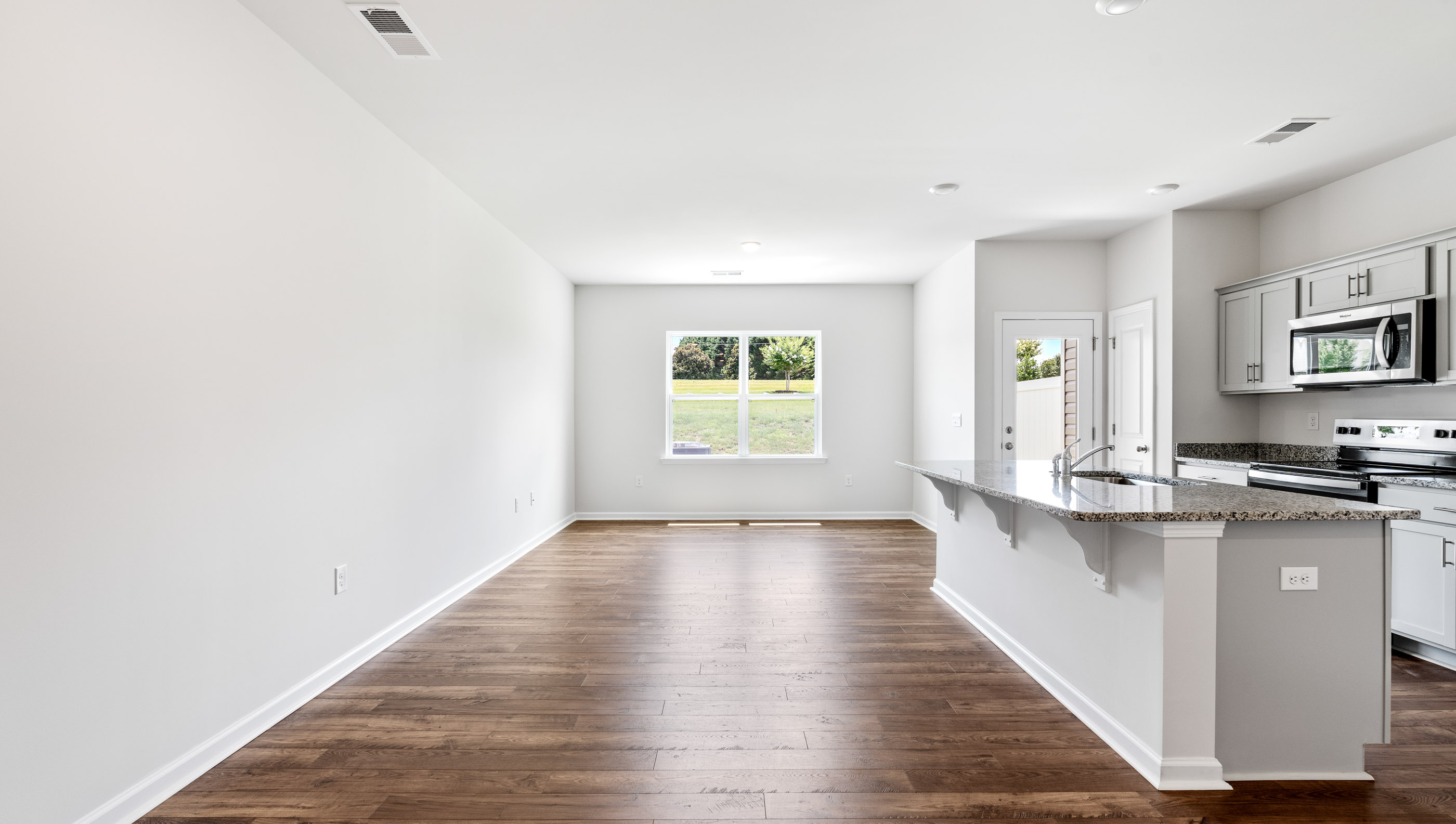 View of combination living and dining area.