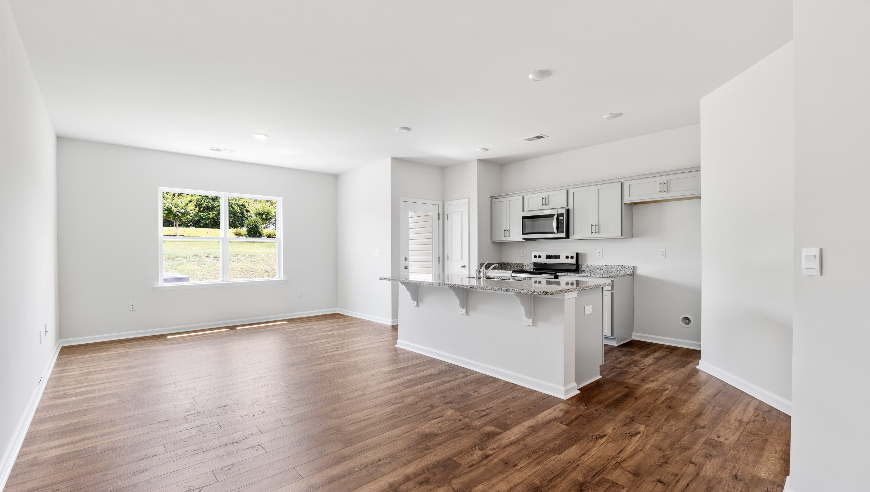 Open floorplan with lots of windows.
