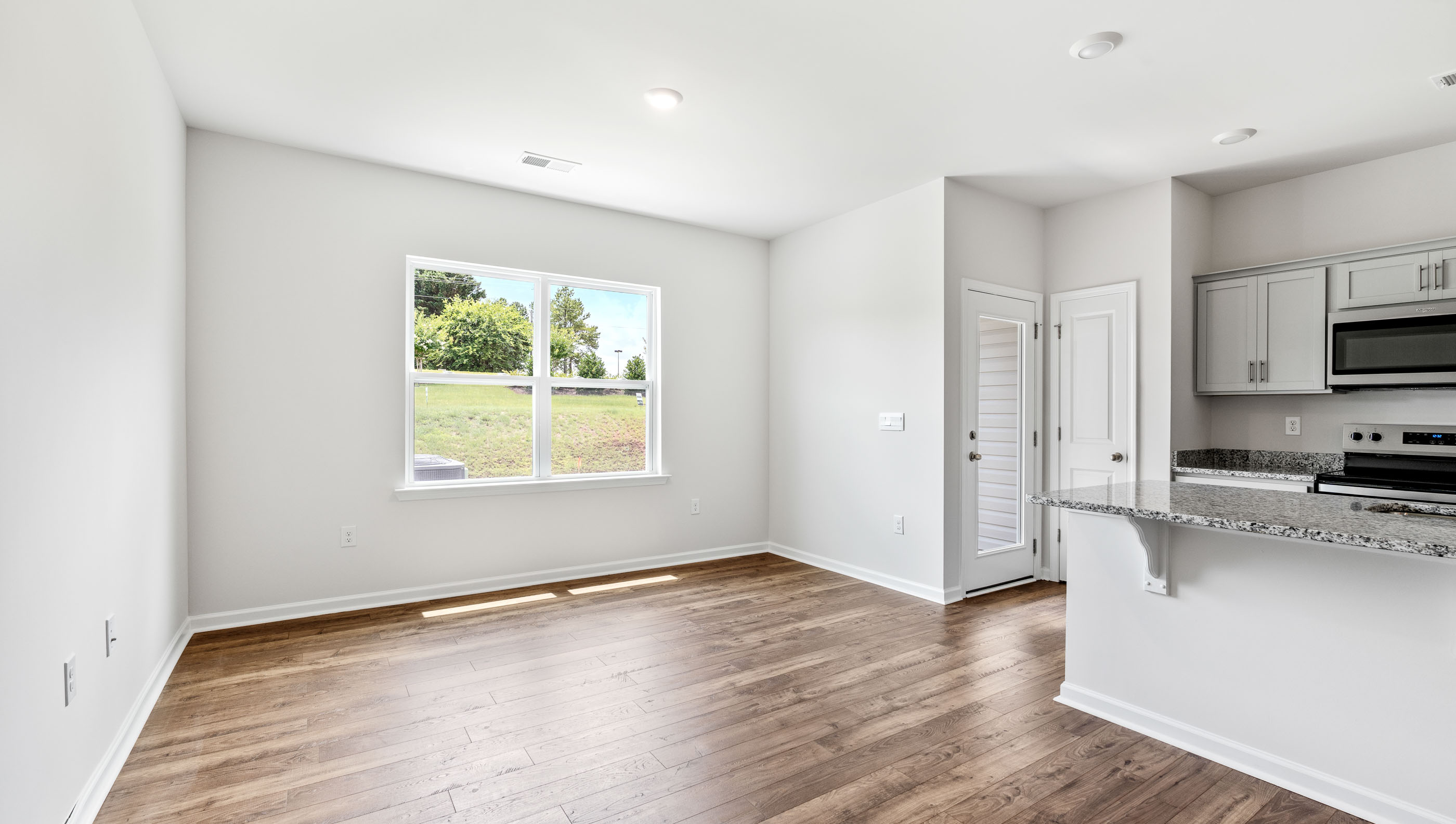 Open floorplan with lots of windows.
