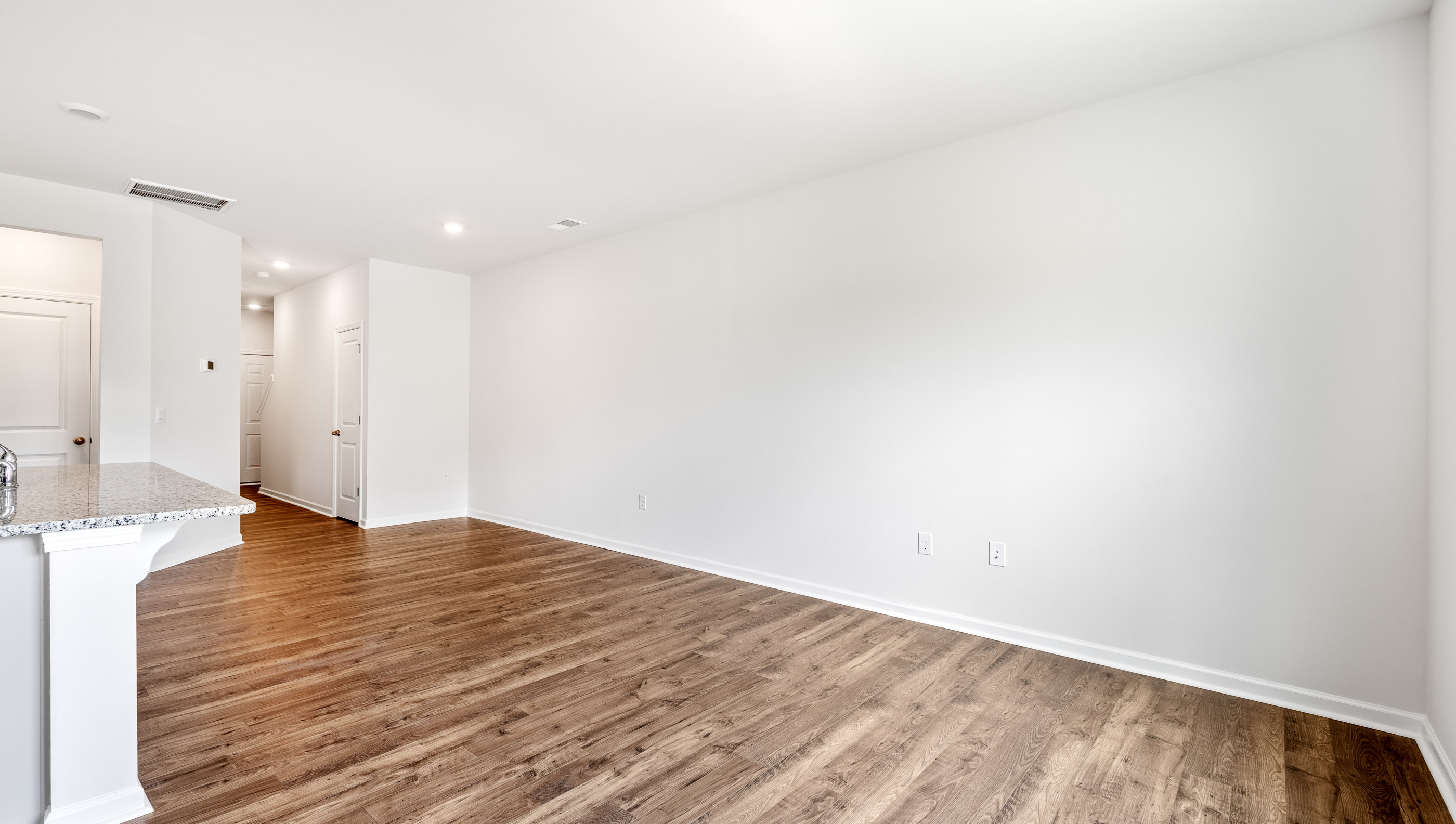 Open floorplan with lots of windows.