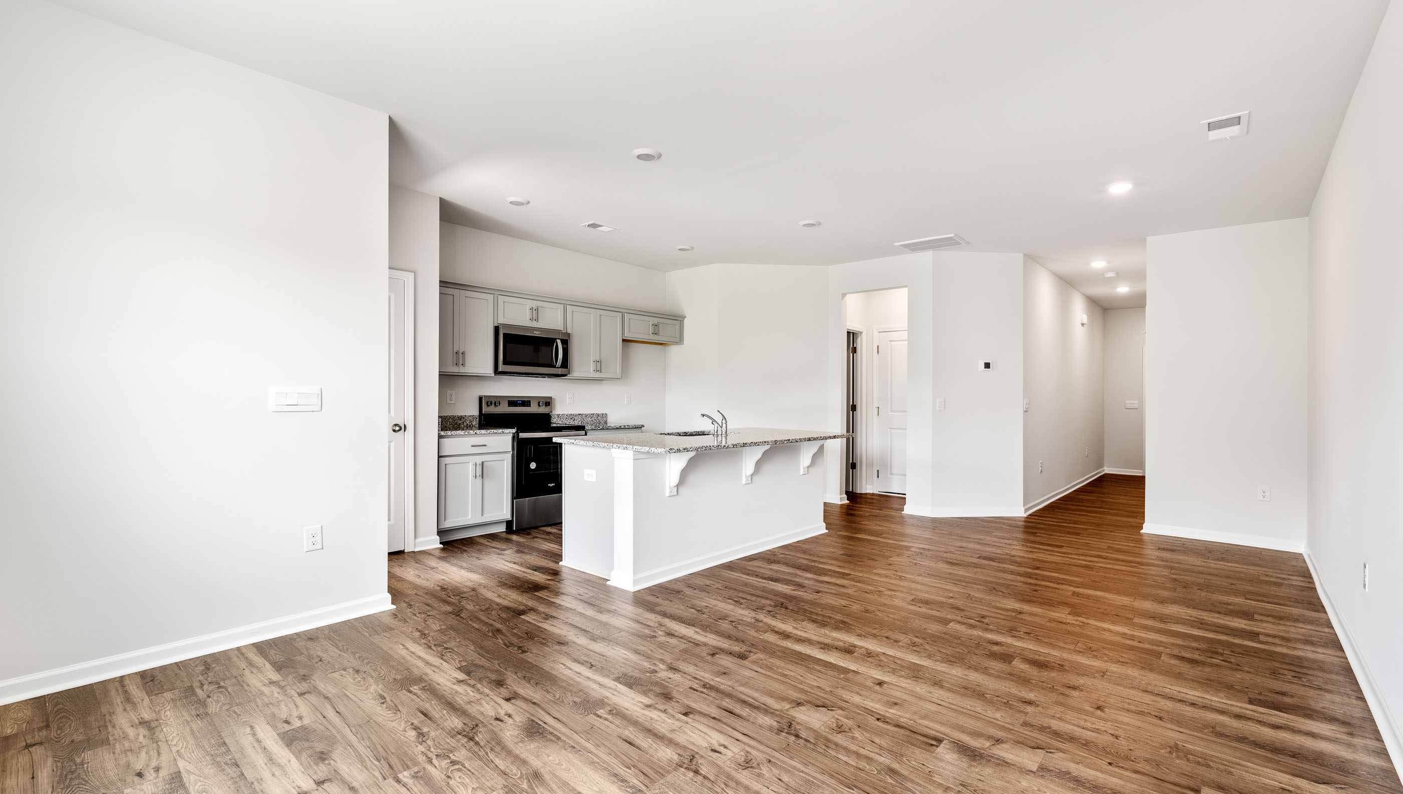 Open floorplan with lots of windows.