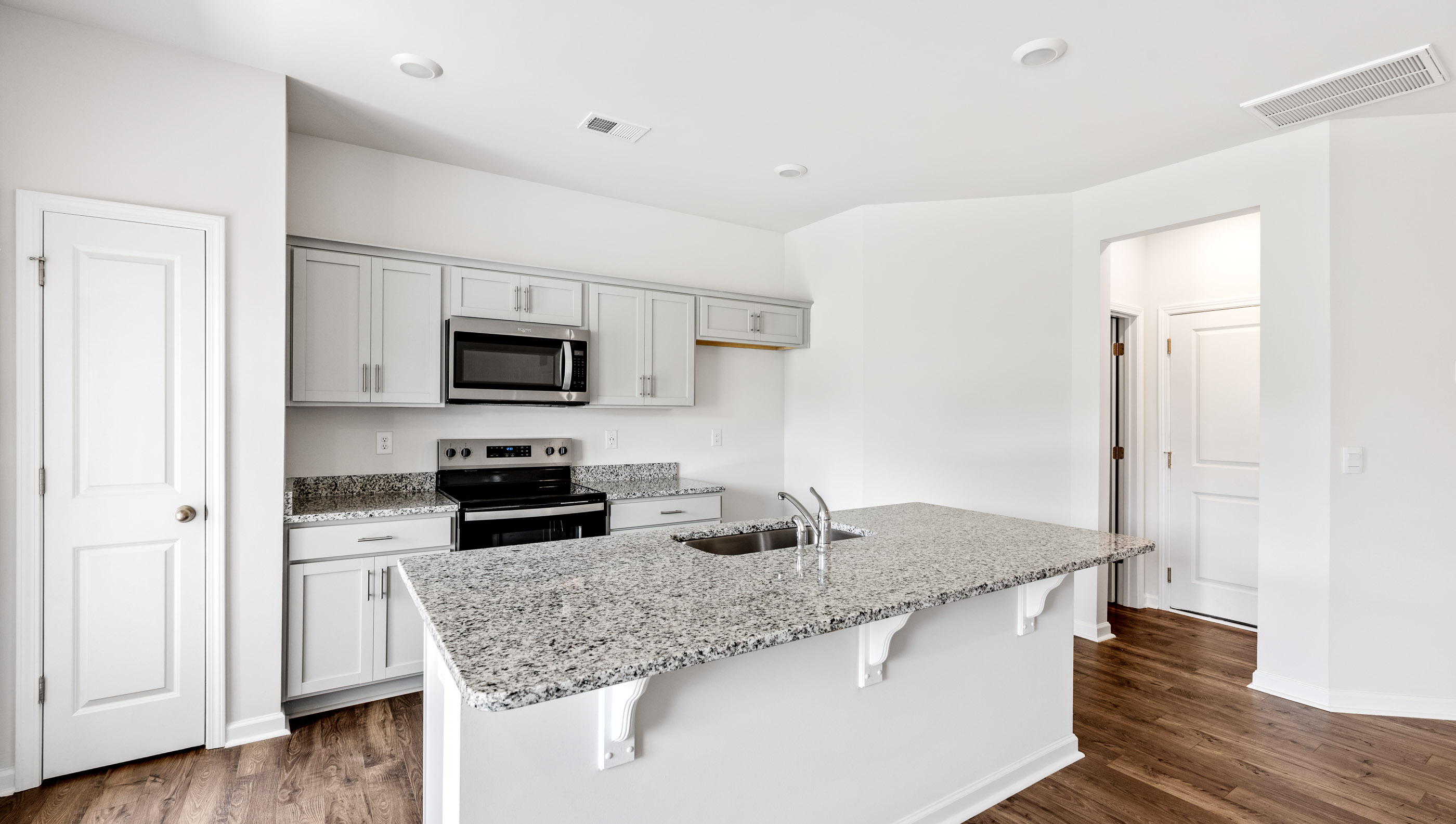 Kitchen island with granite countertops.