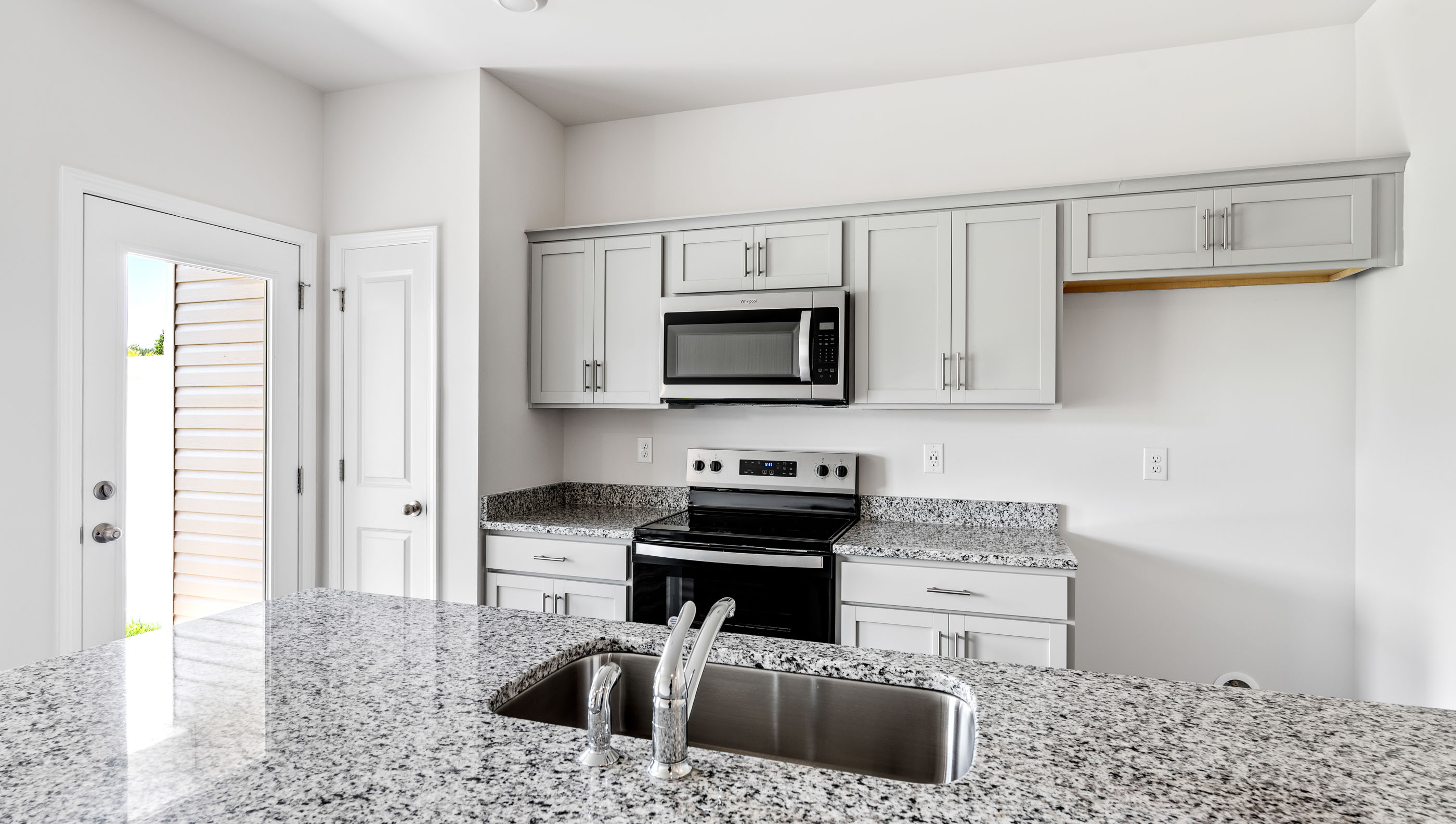 Kitchen island with granite countertops.