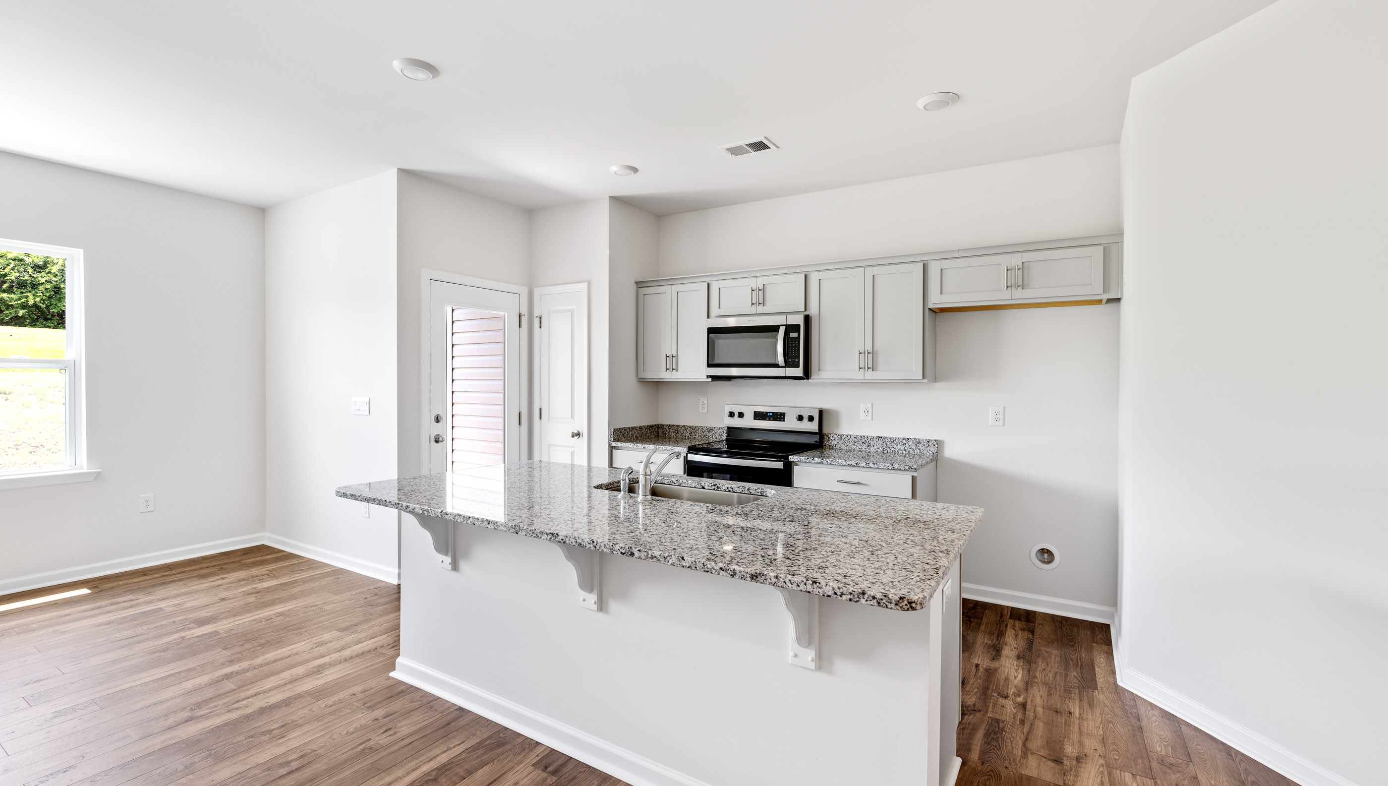 Kitchen island with granite countertops.