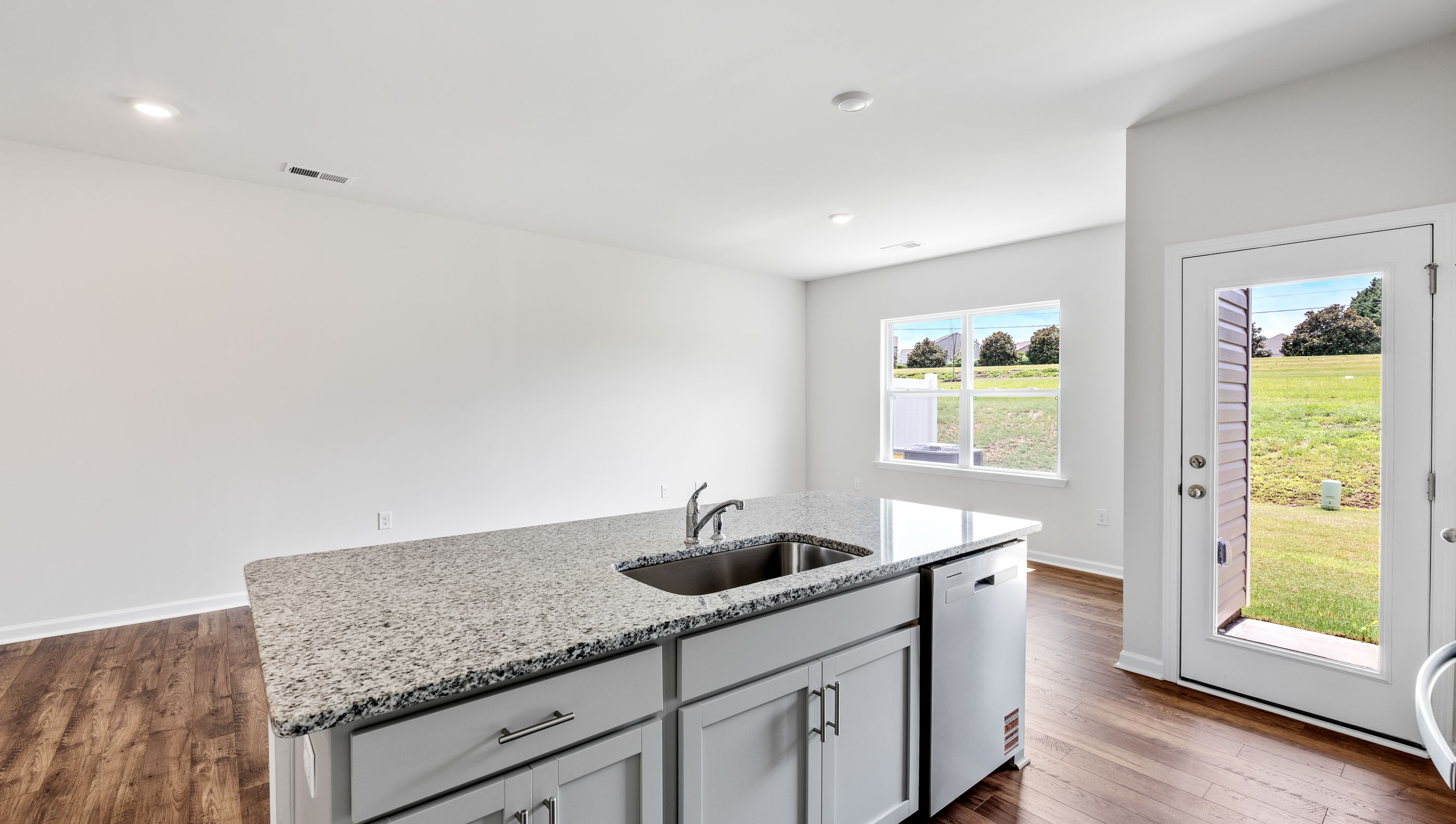 View from kitchen into dining area.
