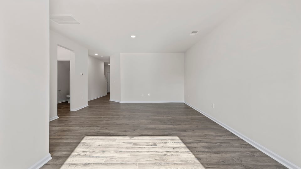 View of combination living and dining area.