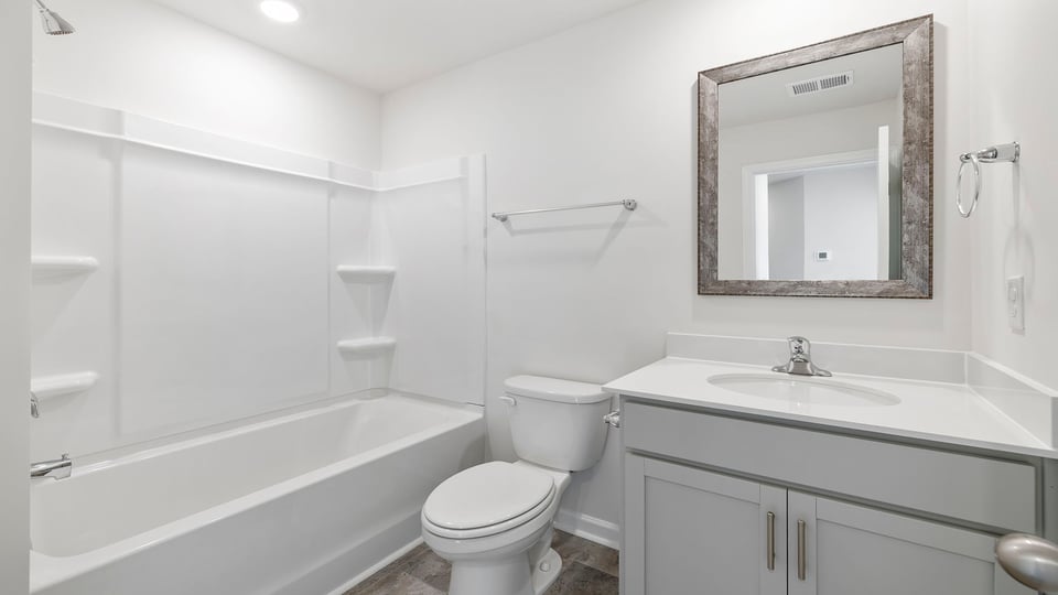 Hall bathroom with shower / tub.