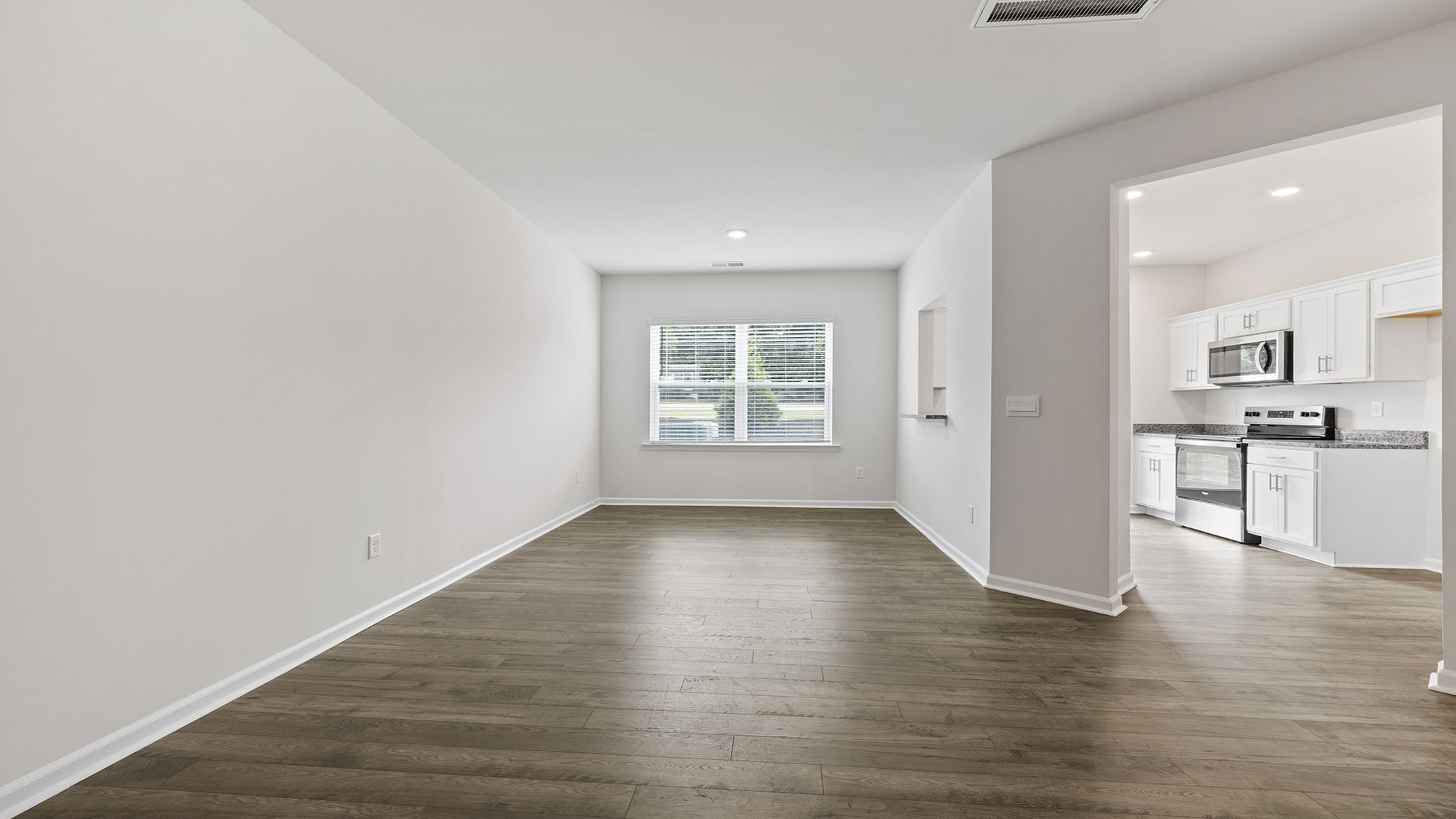 Open floorplan with lots of windows.