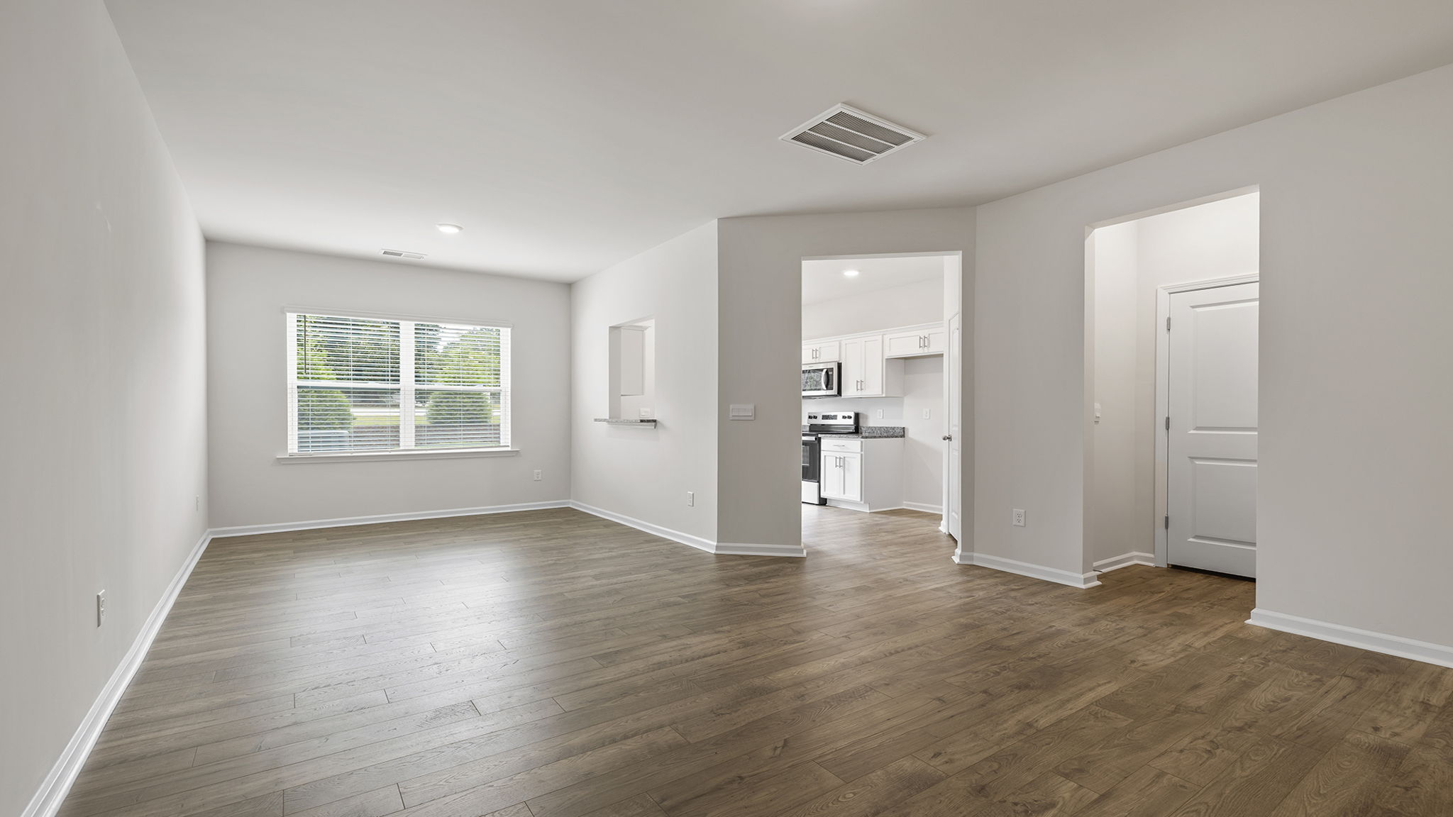 View of combination living and dining area.