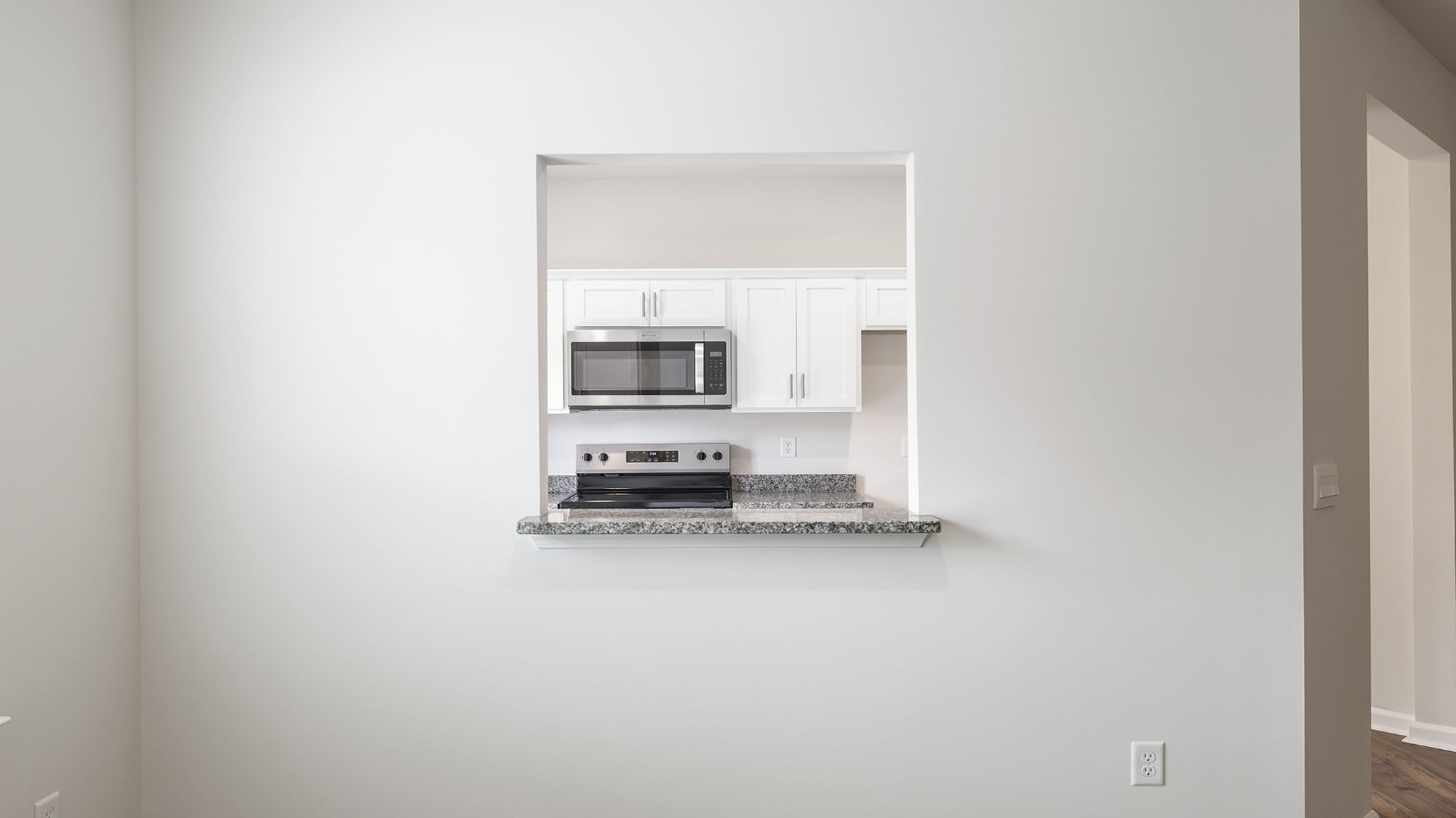 Look through opening into the kitchen.