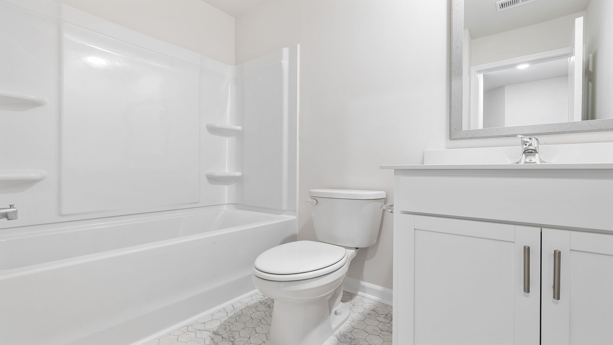 Hall bathroom with shower / tub.